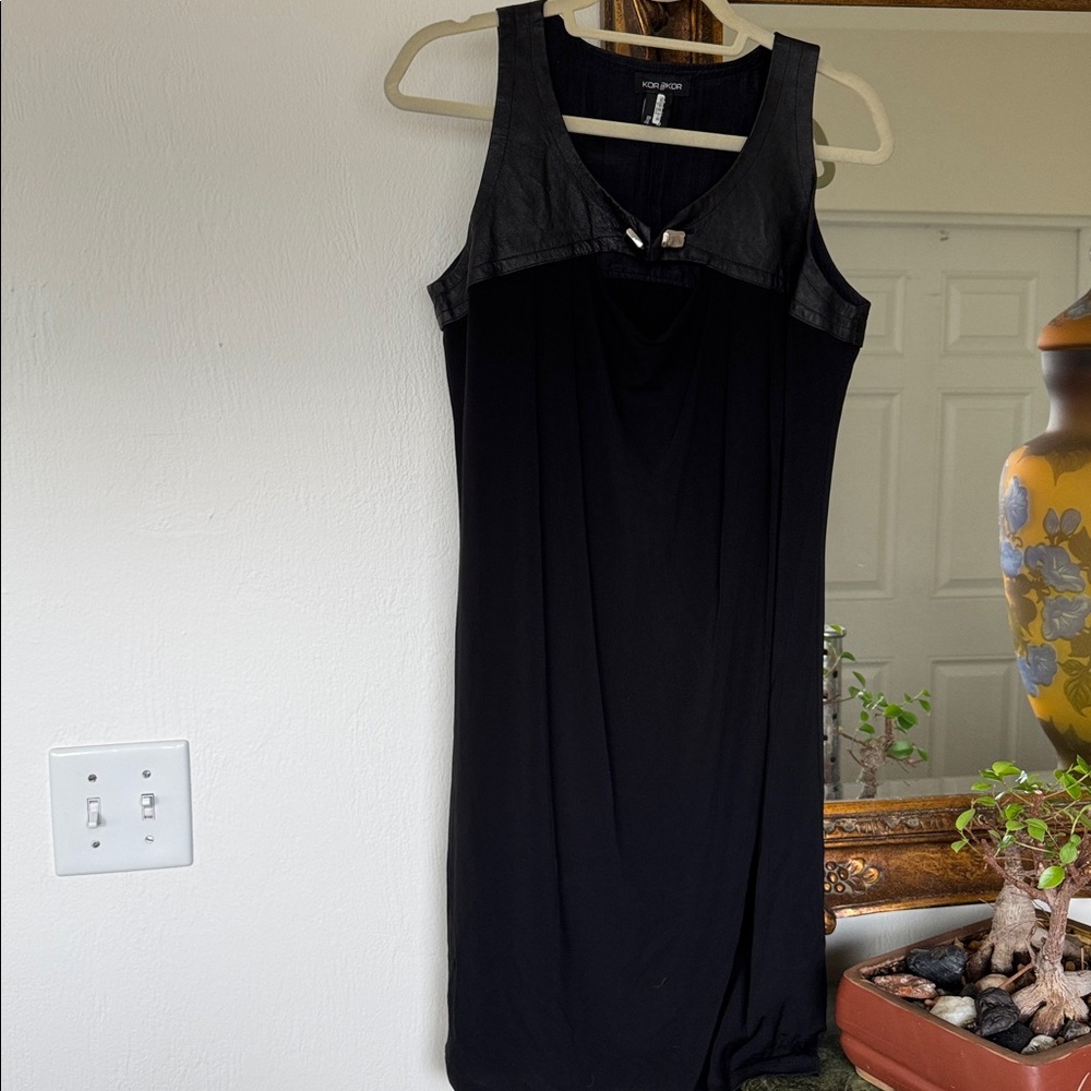 Chic Black Dress with leather Details